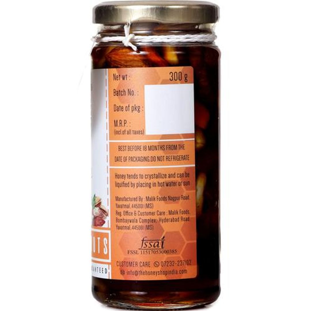 Honey With Dry Fruits Like Figs, Raisins & Nuts